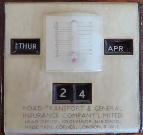 A small desktop perpetual calendar incorporating a thermometer
